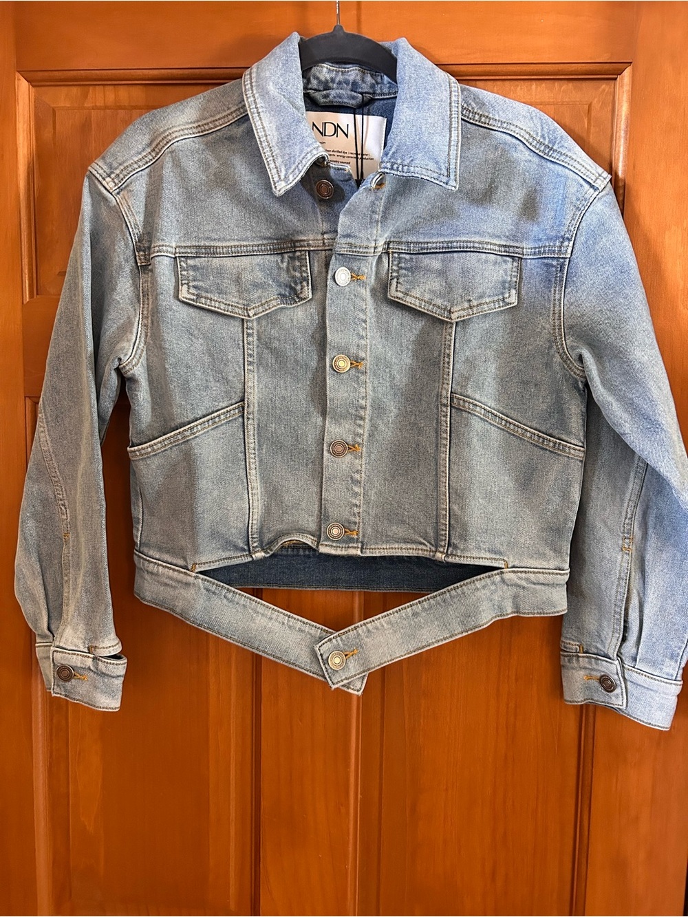 Crop Light Wash Denim Jacket with Adjustable Hem -